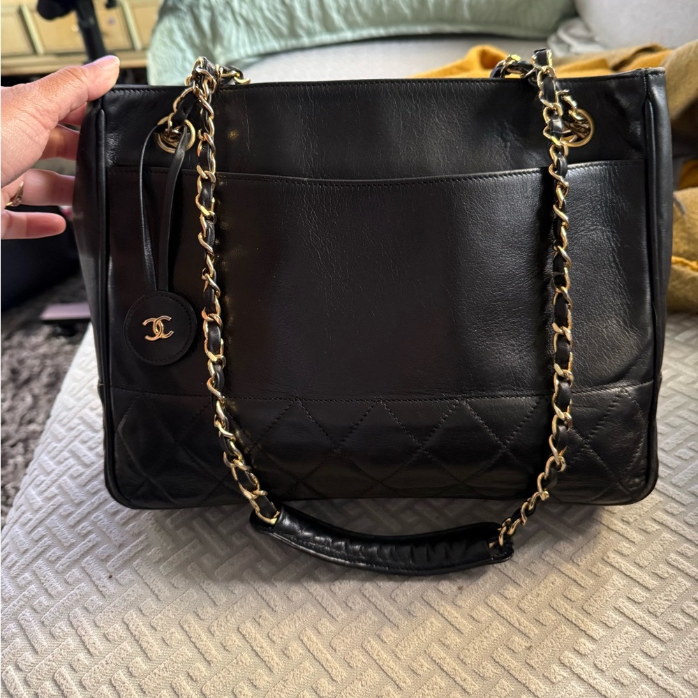 CHANEL Black and Gold Quilted Shoulder Bag